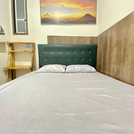 Homestay Batu Kelir Syariah Dieng Mitra Reddoorz Diyeng Exterior foto